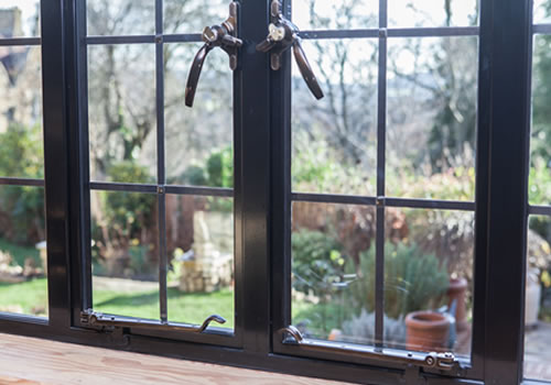 Slimline metal window with traditional fittings