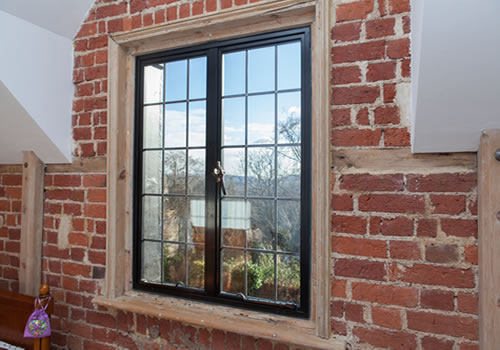 AG210 metal window installed within an original Victorian frame