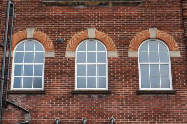 Replacement steel-style windows and doors complementing Haslemere Hall