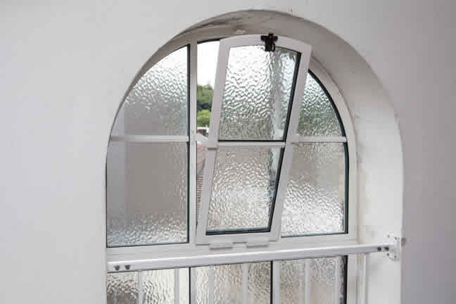 Replacement metal-frame windows installed at Haslemere Hall